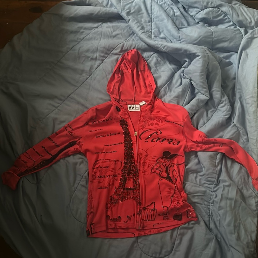 Red Keren Hart women’s sweater great condition barely worn.